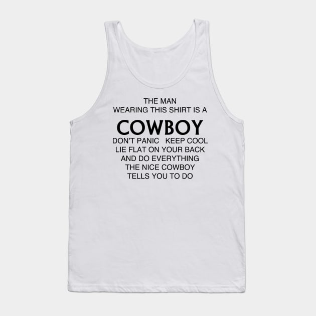 THE MAN WEARING THIS SHIRT IS A COWBOY Tank Top by TheCosmicTradingPost